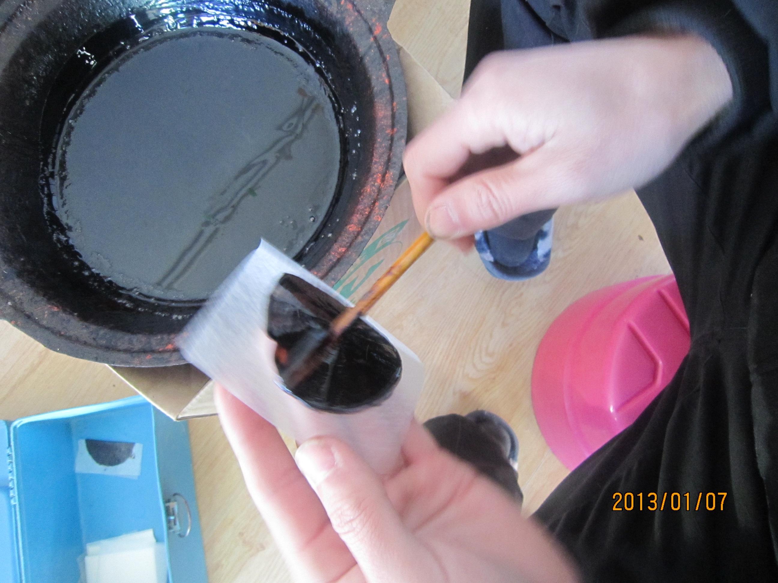 传统黑膏药的制作过程